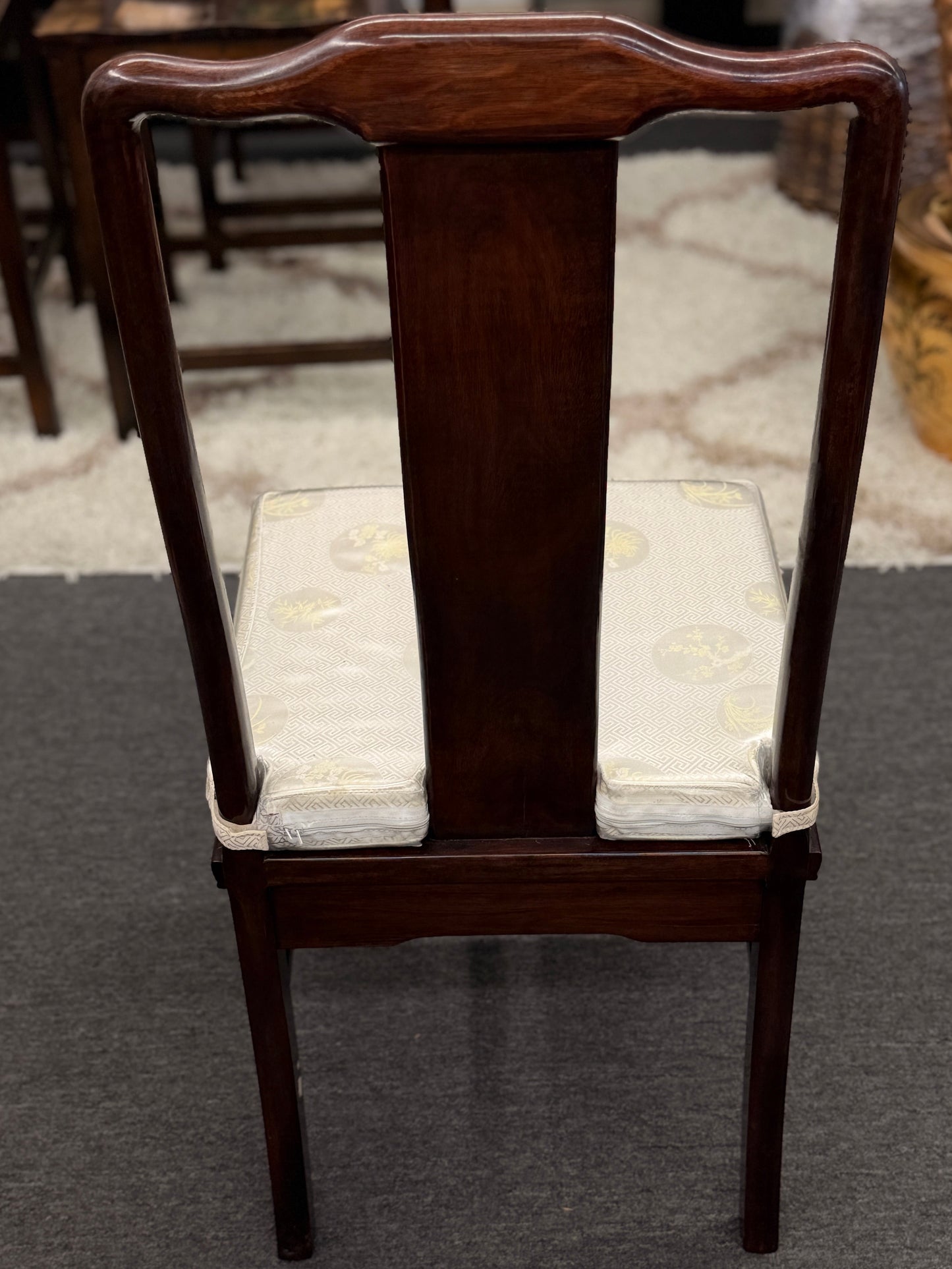 Chinoiserie inlaid wood 9pc oval dining set featuring a glass top table and mother of pearl detail at 2nd Debut Houston consignment showroom