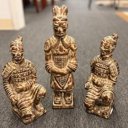 Set of three Terracotta Warrior replica figurines including one standing officer and two kneeling archers finished in a distressed antiqued gilt and terracotta-wash patina in excellent condition.