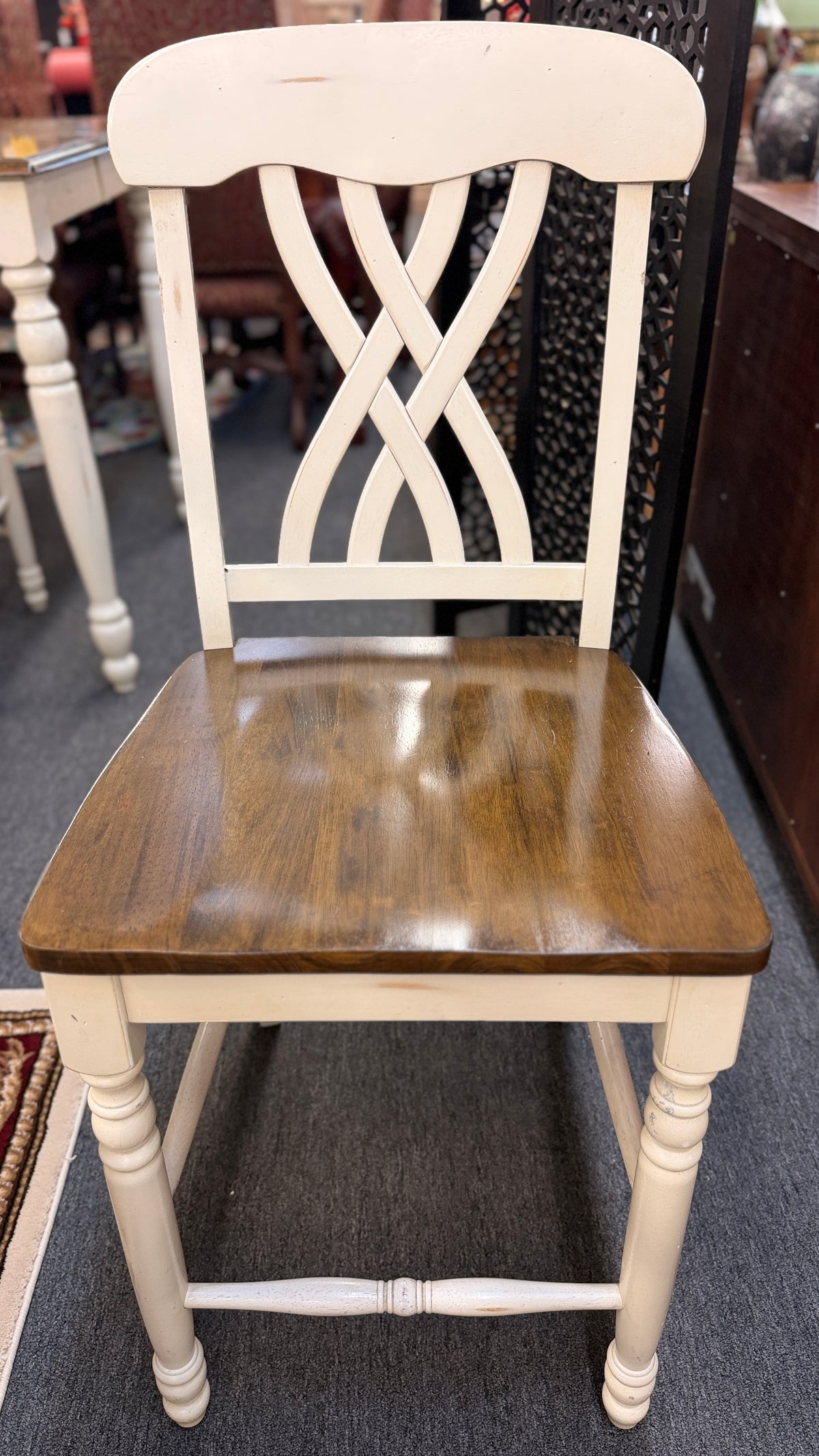 Two-tone counter-height dining set including a rectangular wood-top table with cream-painted turned legs and four matching open-back stools in excellent condition.