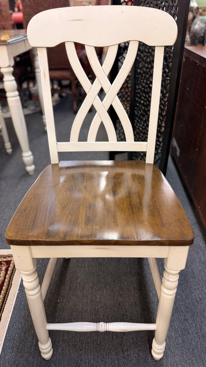 Two-tone counter-height dining set including a rectangular wood-top table with cream-painted turned legs and four matching open-back stools in excellent condition.