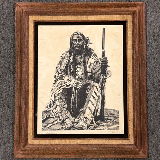Framed artwork of a Native American figure holding a rifle and a book on a textured gray background