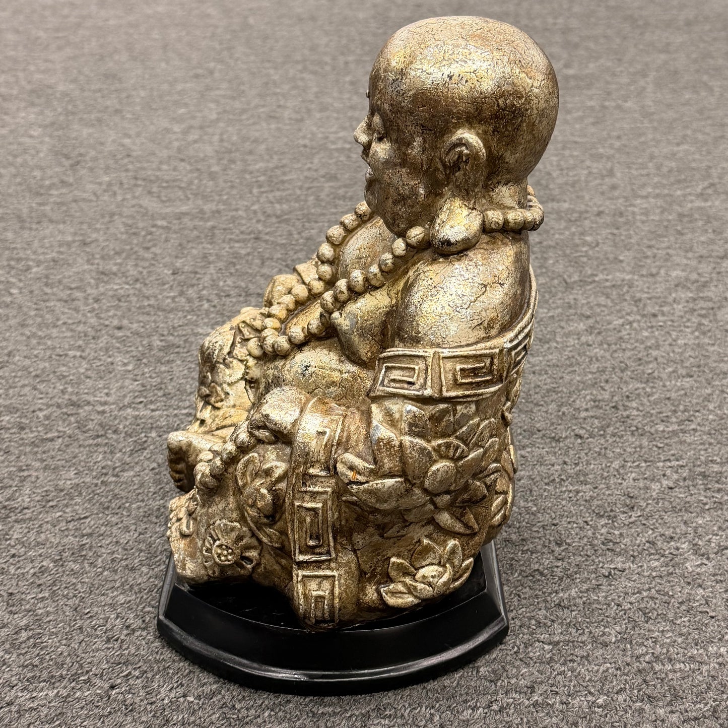 Decorative figurine on a gray surface