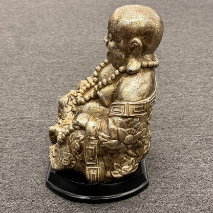 Decorative figurine on a gray surface