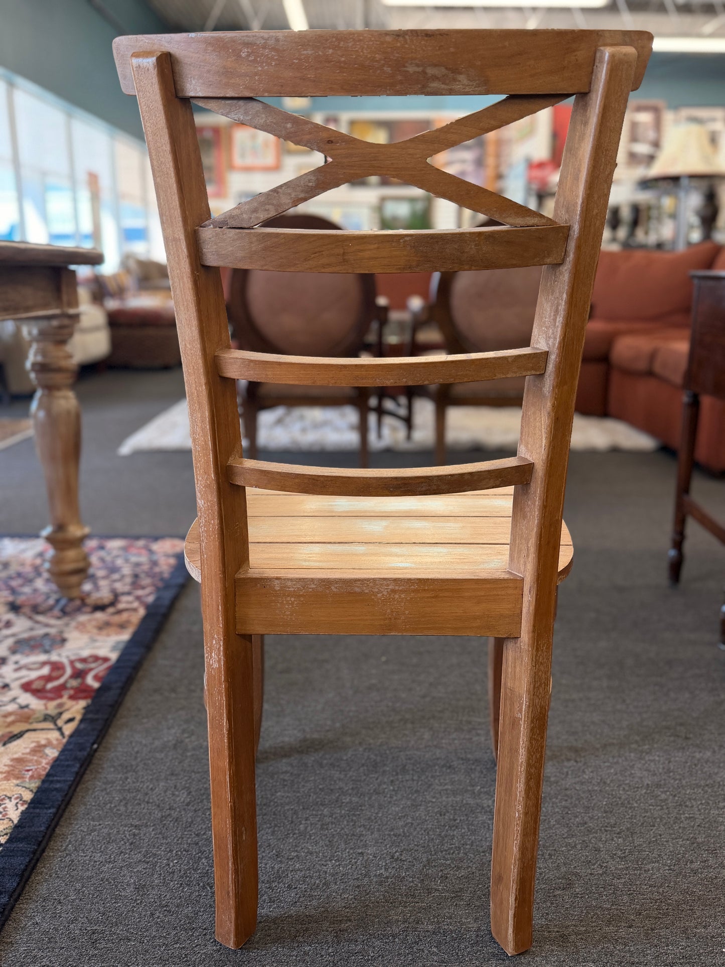 Wooden chair in a furniture store setting