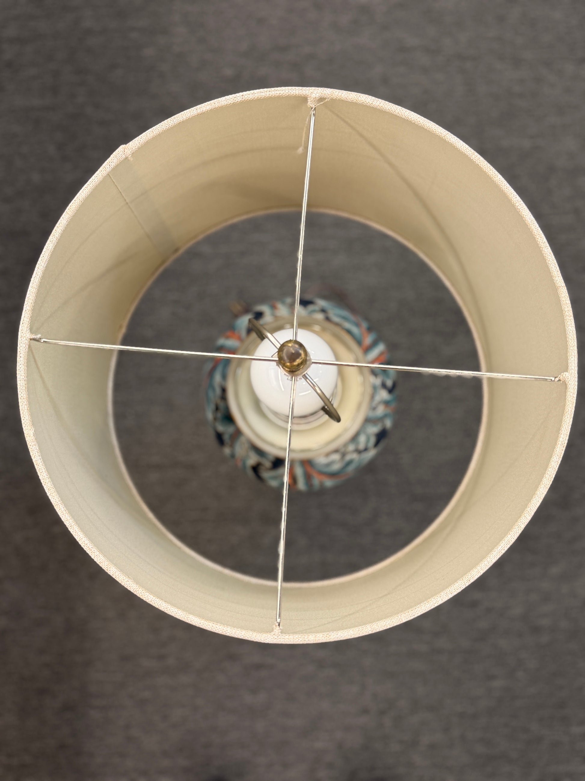 Close-up of a lampshade with a dark background