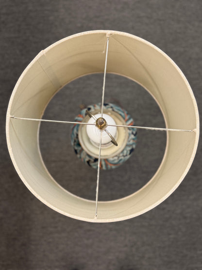 Close-up of a lampshade with a dark background