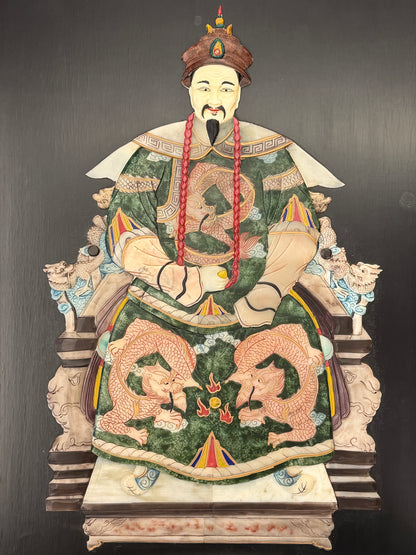 Traditional Asian emperor portrait framed wall art featuring an enthroned figure with green and gold 3D textured accents in a dark wood frame at 2nd Debut Houston consignment showroom