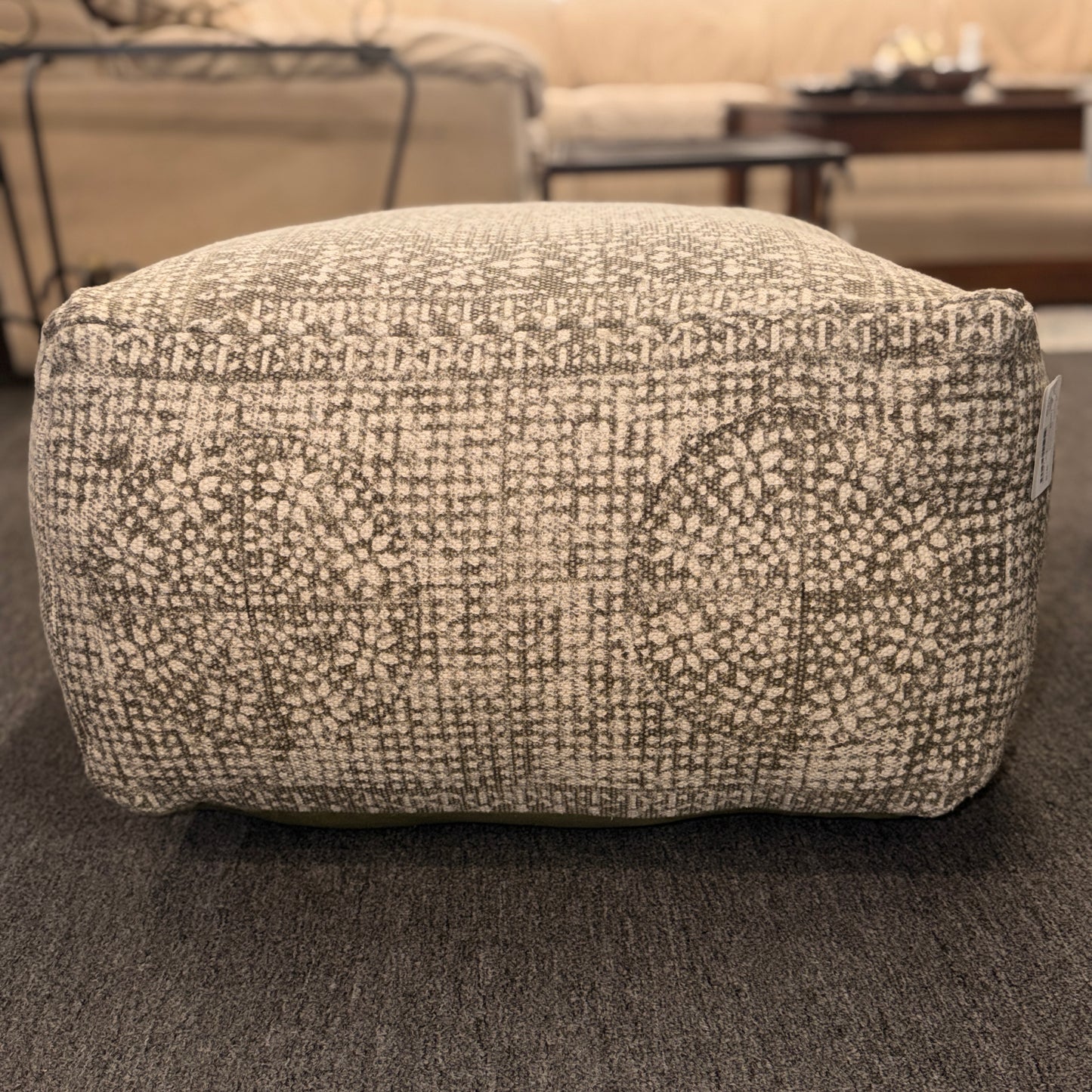 Textured ottoman in a living room setting