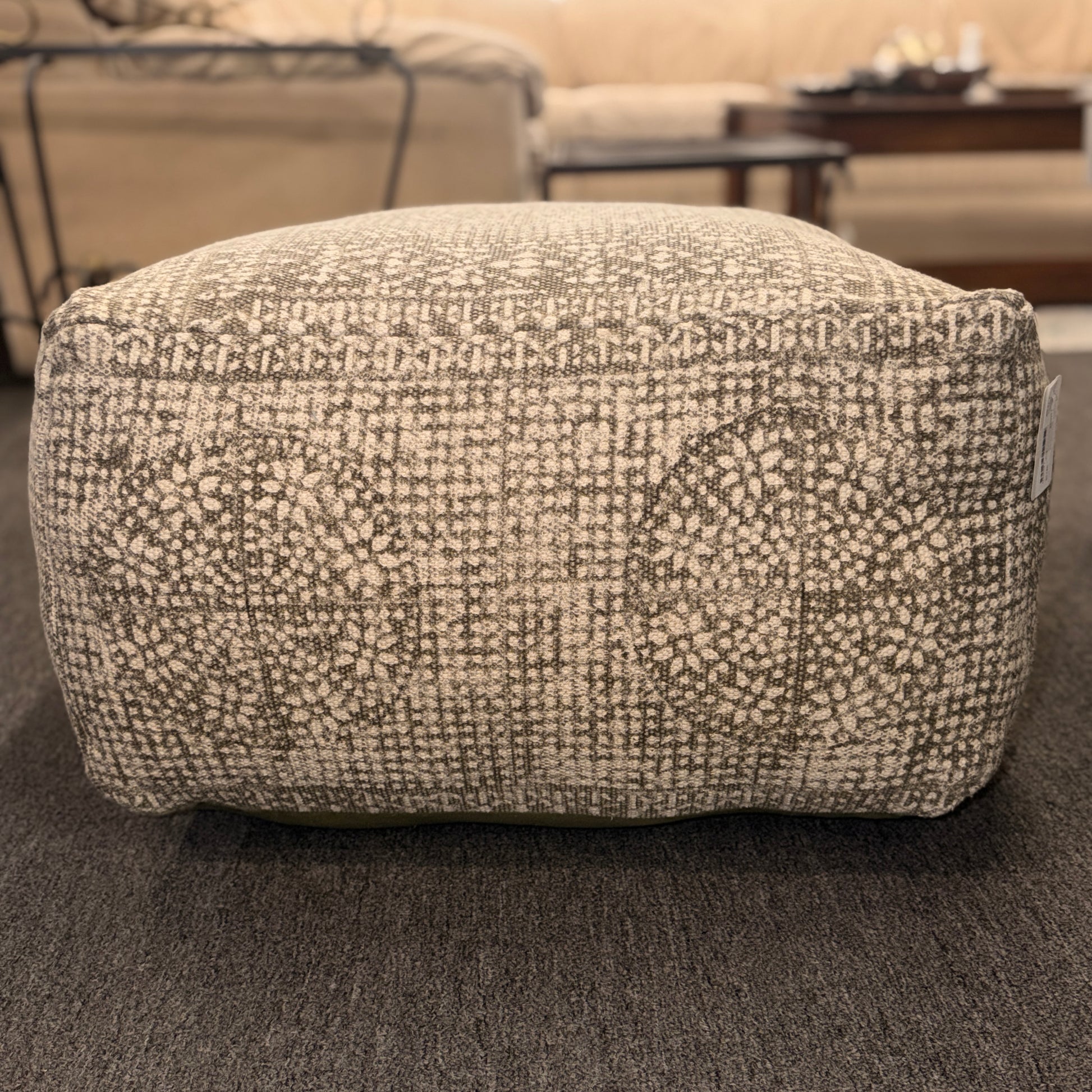Textured ottoman in a living room setting