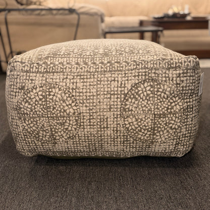 Textured ottoman in a living room setting