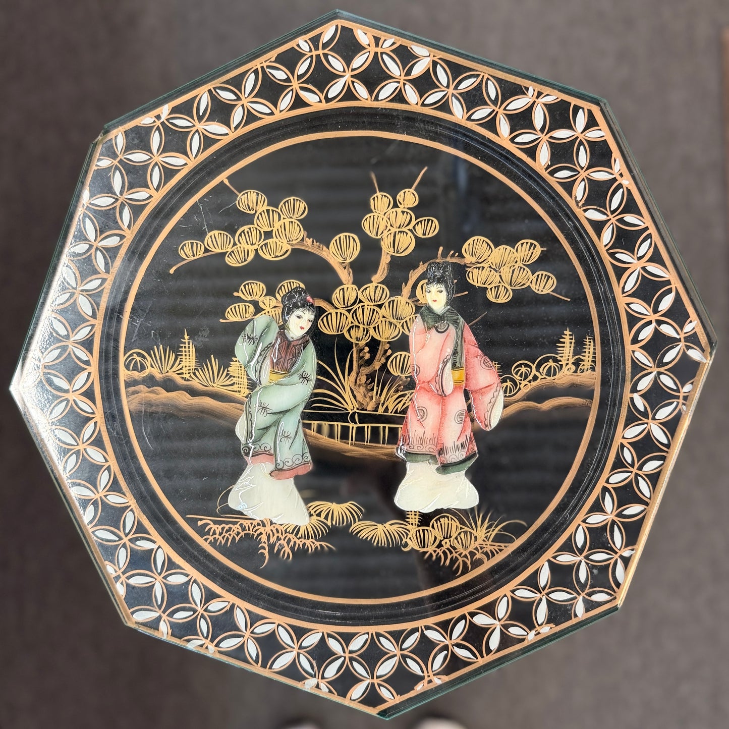 Traditional Chinoiserie black lacquer and gold plant stand pedestal with an octagonal top, intricate designs, and cabriole legs at 2nd Debut Houston consignment showroom
