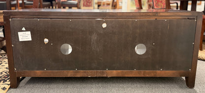 Contemporary low profile bowed front TV stand and media console with open shelving at 2nd Debut Houston consignment showroom