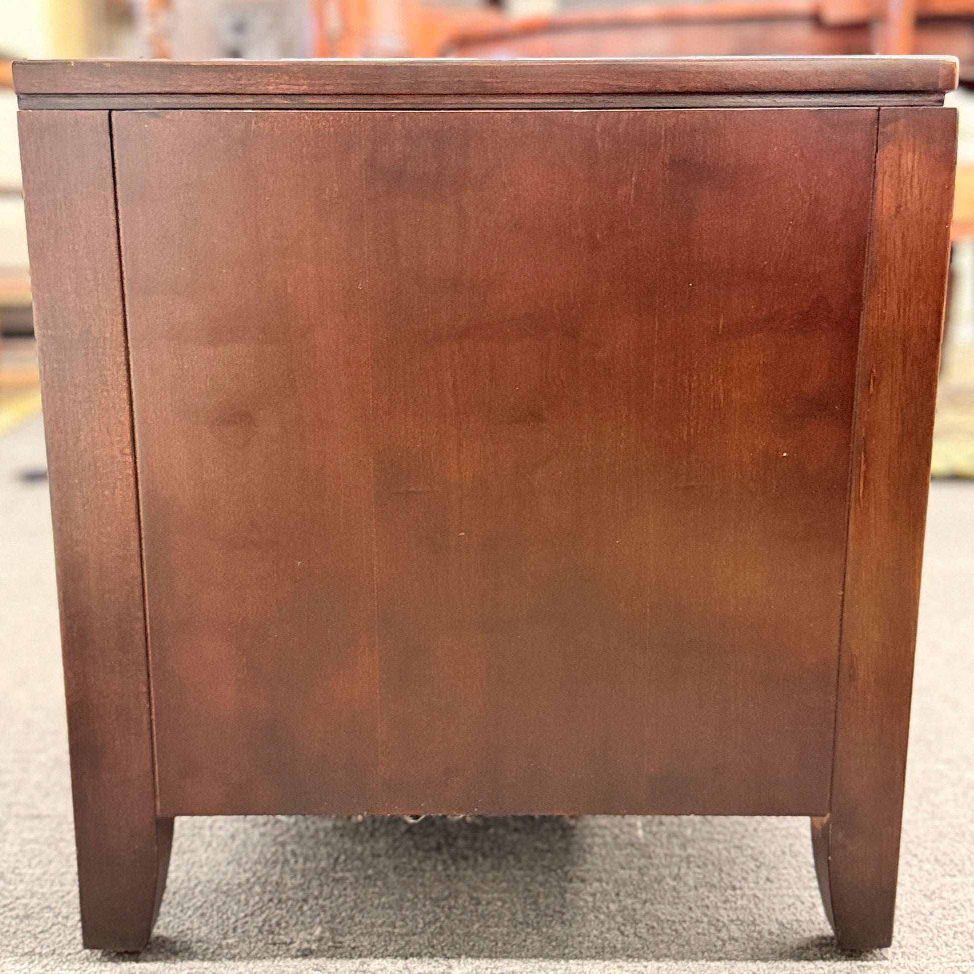 Wooden cabinet with a blurred background