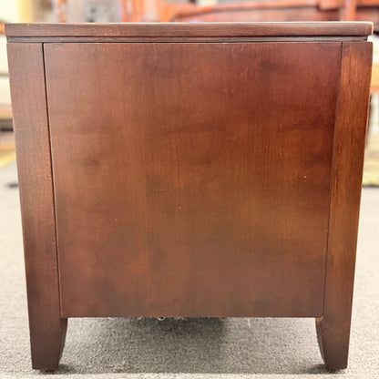 Wooden cabinet with a blurred background