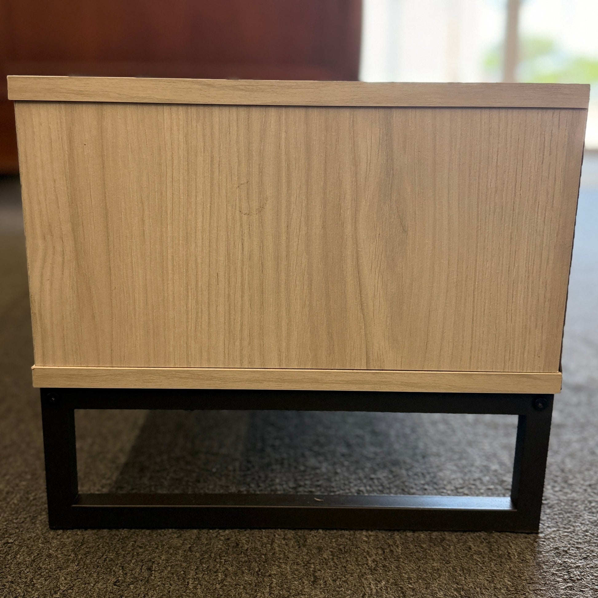A contemporary, low-profile 53-inch TV stand with two wide drawers, sleek black bar pull handles, and a slim black metal base frame.