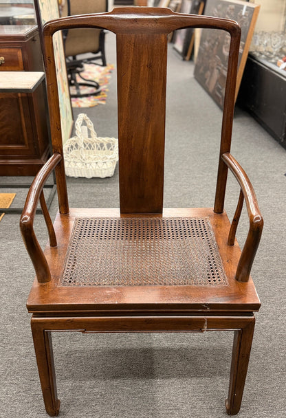 A 9-piece traditional wooden dining set featuring a large rectangular table, two matching armchairs, and six side chairs with woven rattan backrests.