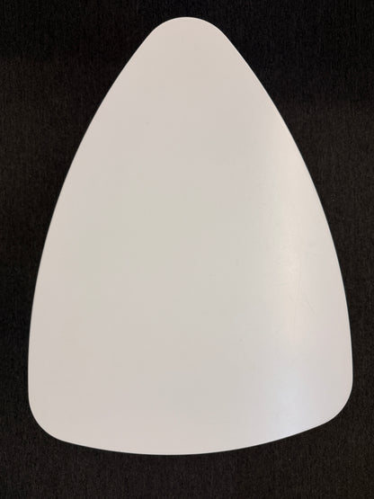 A retro-inspired triangular end table featuring a smooth white guitar-pick-shaped top supported by three splayed, tapered dark wood legs.