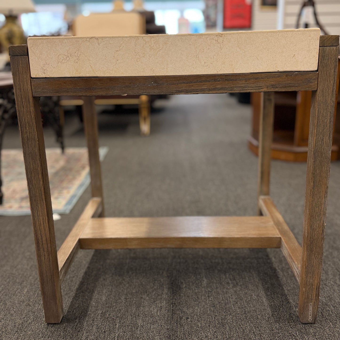 Square end table featuring a thick light-colored stone top, distressed wood frame, and a lower crossbar shelf with rustic styling.