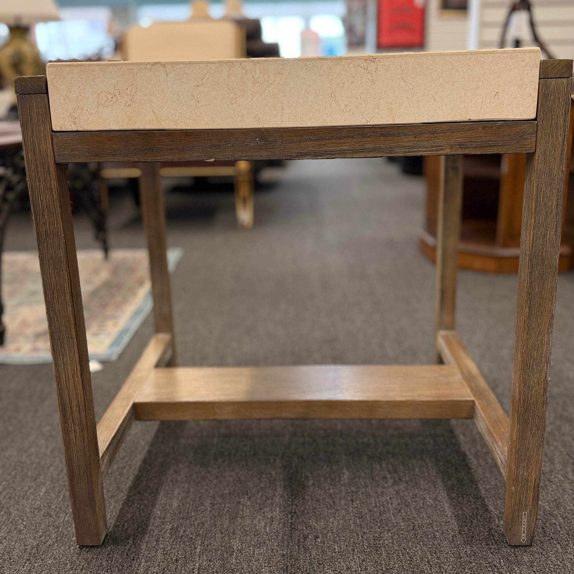 Square end table featuring a thick light-colored stone top, distressed wood frame, and a lower crossbar shelf with rustic styling.