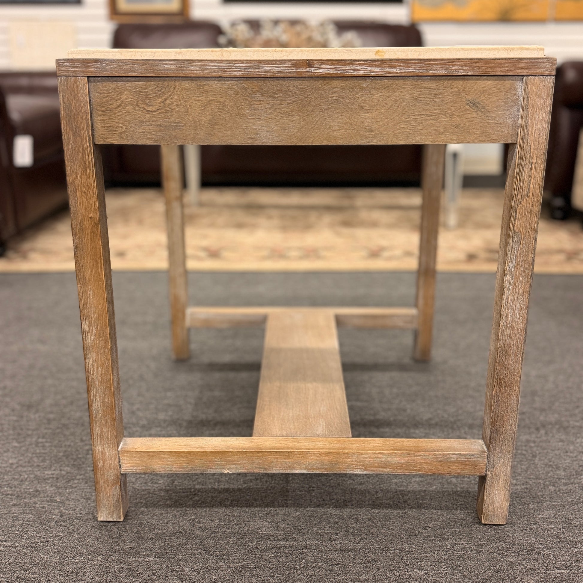 Square end table featuring a thick light-colored stone top, distressed wood frame, and a lower crossbar shelf with rustic styling.