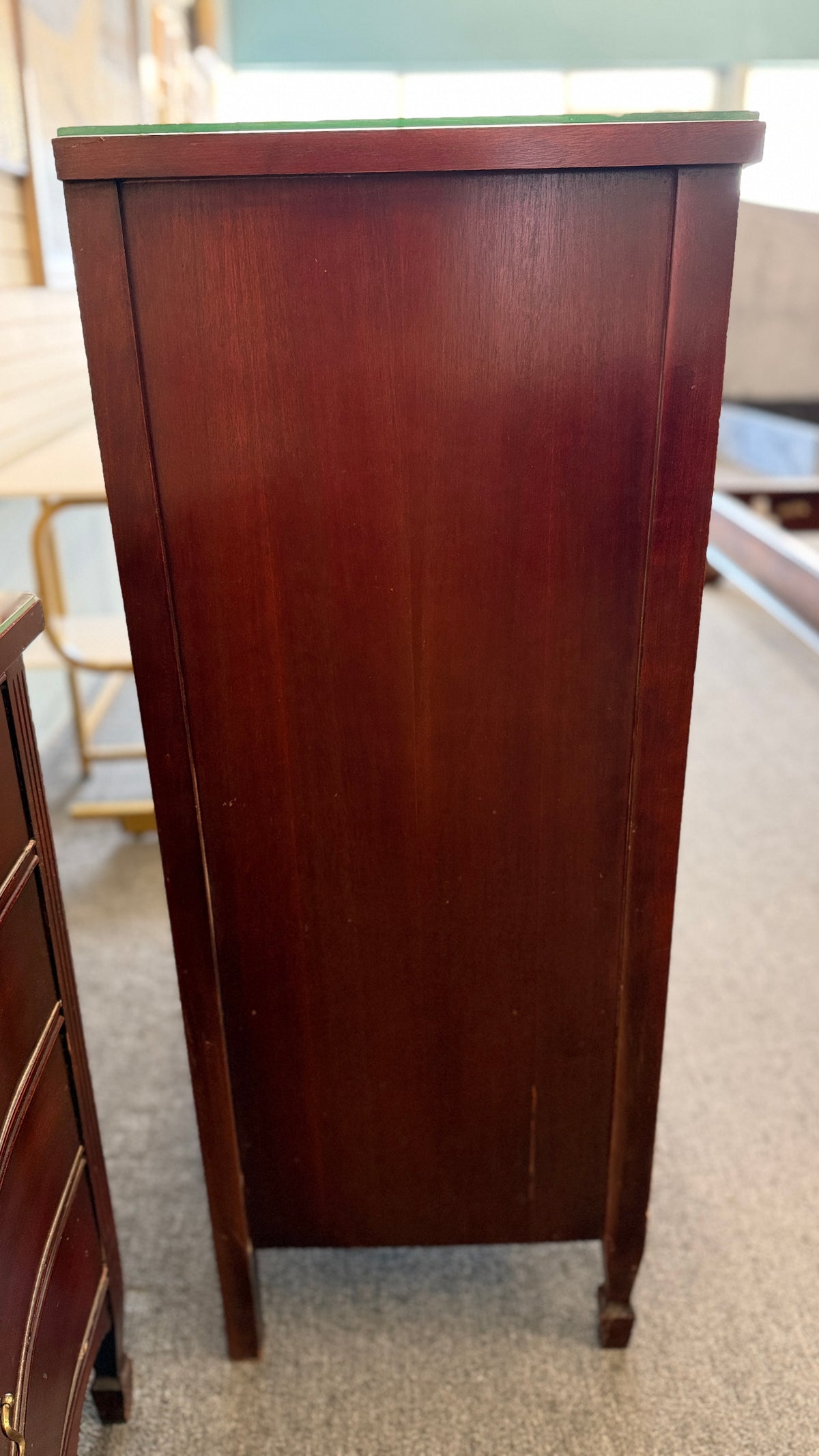 A minimalist modern 5-drawer tallboy chest in light cerused oak featuring handle-less recessed drawer fronts in good condition.
