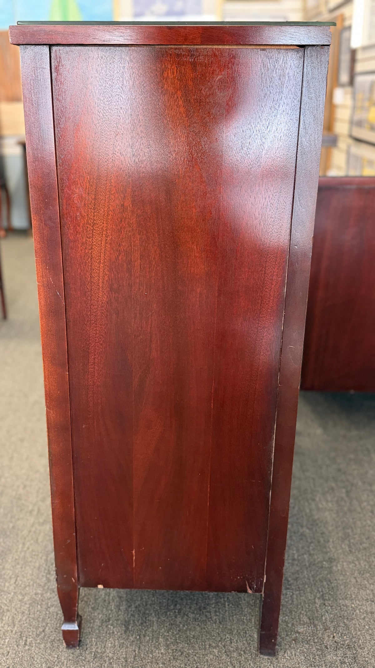 A minimalist modern 5-drawer tallboy chest in light cerused oak featuring handle-less recessed drawer fronts in good condition.