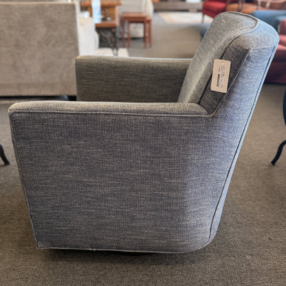 A classic Bassett armchair upholstered in a textured light grayish-blue fabric in excellent condition.