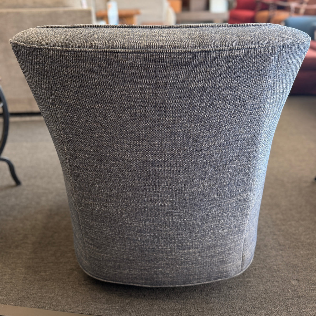 A classic Bassett armchair upholstered in a textured light grayish-blue fabric in excellent condition.