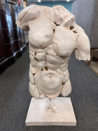 Classical-style male torso sculpture with a distressed stone-look finish, realistic crackled detailing, and a square display base.