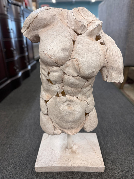 Classical-style male torso sculpture with a distressed stone-look finish, realistic crackled detailing, and a square display base.