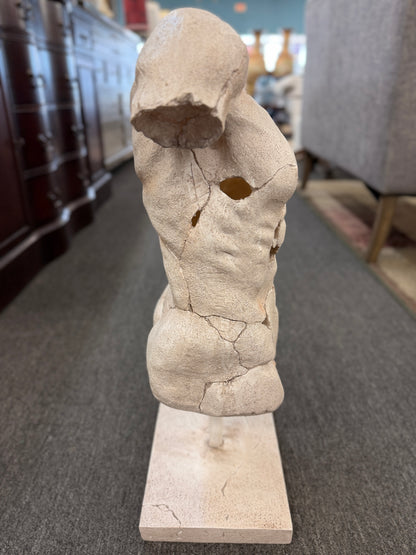 Classical-style male torso sculpture with a distressed stone-look finish, realistic crackled detailing, and a square display base.