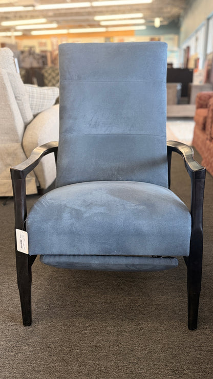 A contemporary high-back recliner upholstered in slate-blue textured fabric framed by slim contoured dark-wood armrests in excellent condition.