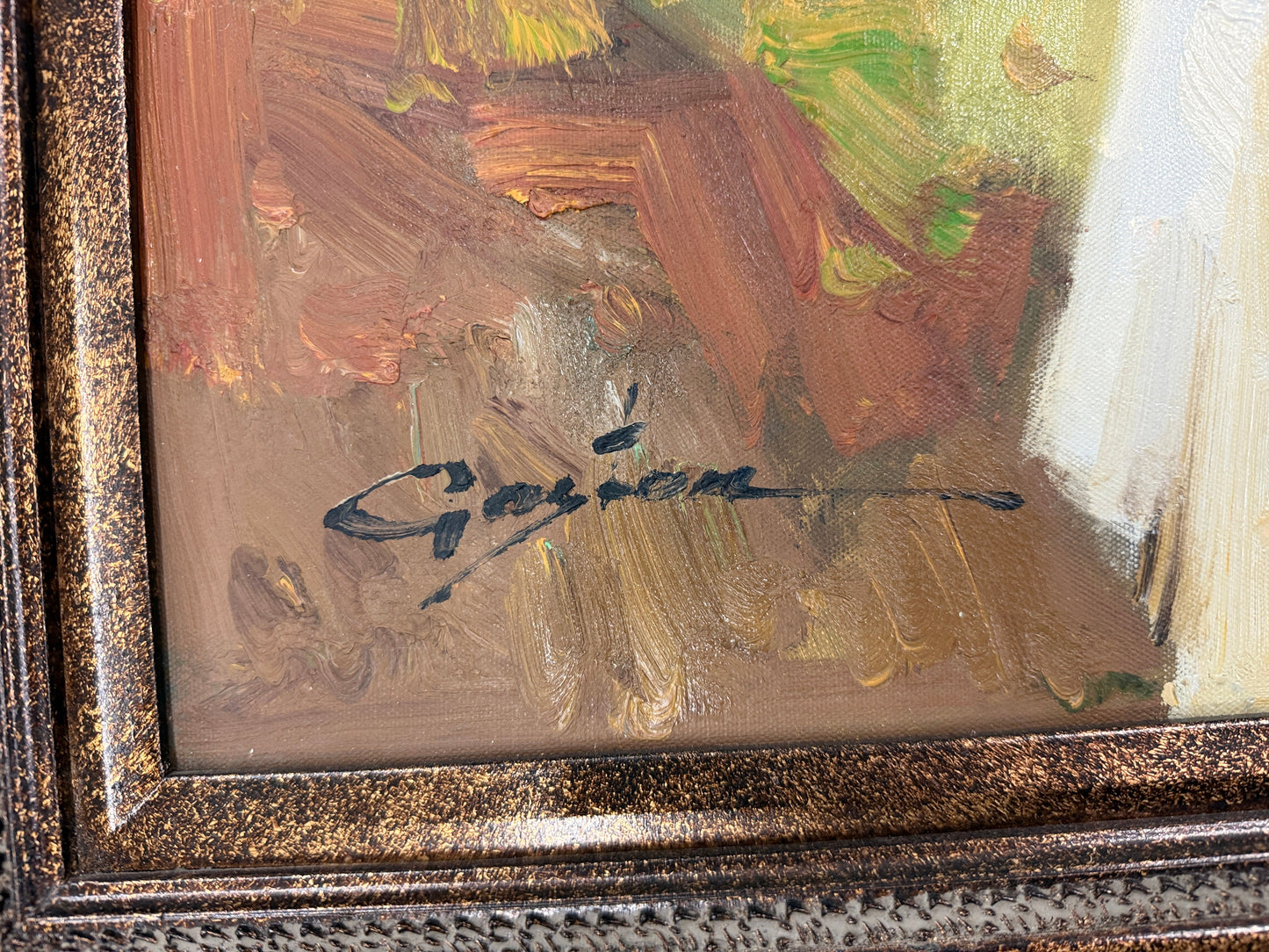A heavy-impasto floral painting featuring white and periwinkle flowers in a glass vase with citrus fruit in an ornate bronze frame in excellent condition.