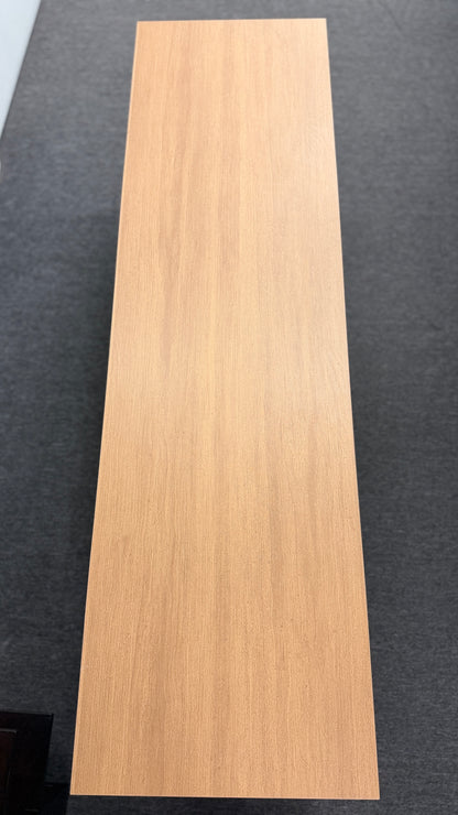 A low-profile minimalist TV stand cabinet featuring textured tambour-style vertical fluted sliding doors in good condition.