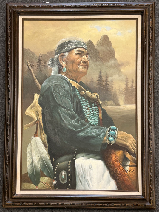 Realistic oil painting portrait of an Indigenous elder with traditional turquoise jewelry, a headband, a bow, and feathers, framed in wood at 2nd Debut Houston consignment showroom
