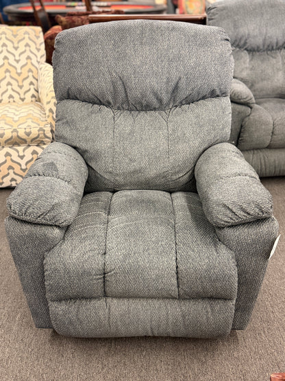 A plush fabric and wood La-Z-Boy reclining armchair in excellent condition.