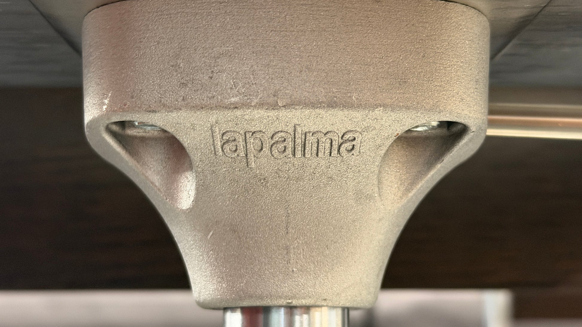 A set of four contemporary Lapalma-style adjustable barstools featuring curved bentwood scoop seats, metal frames, integrated footrests, and heavy disc bases in good condition.