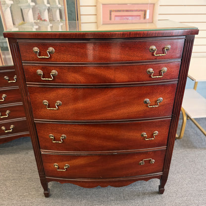A minimalist modern 5-drawer tallboy chest in light cerused oak featuring handle-less recessed drawer fronts in good condition.