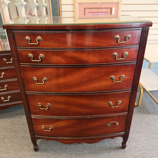 A minimalist modern 5-drawer tallboy chest in light cerused oak featuring handle-less recessed drawer fronts in good condition.