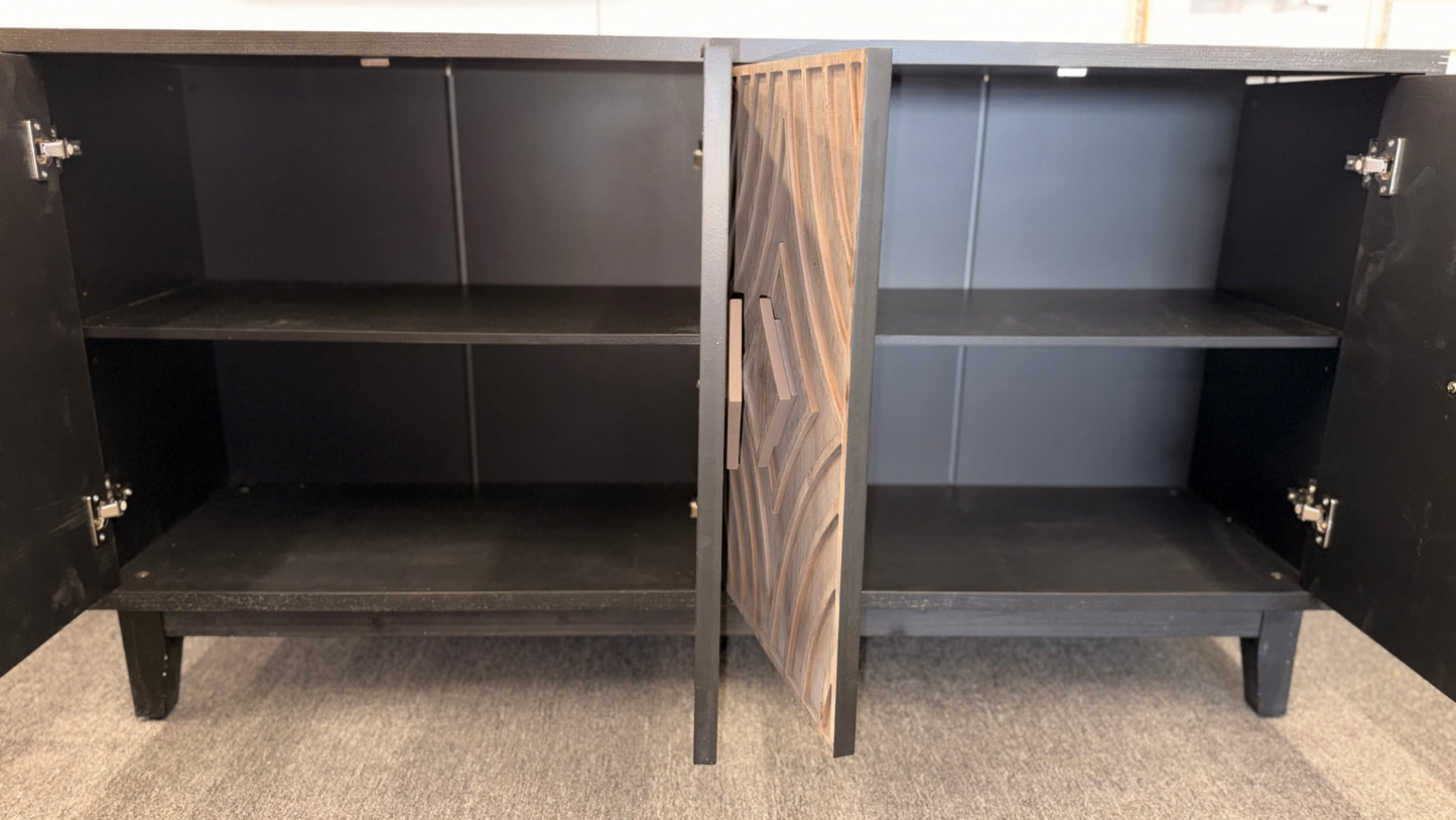 A modern 4-door credenza sideboard with an intricate, carved geometric design featuring concentric diamond and arched wave patterns across the door fronts.