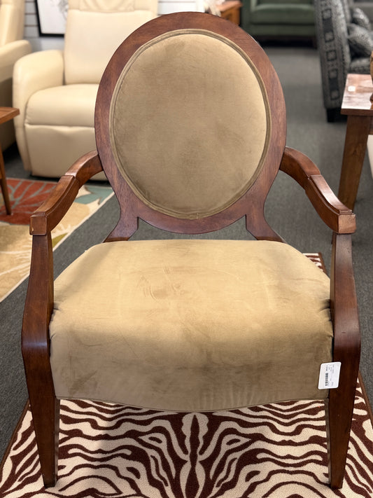 Traditional oval back wood accent armchair in sage taupe velvet upholstery on a zebra print rug at 2nd Debut Houston consignment showroom