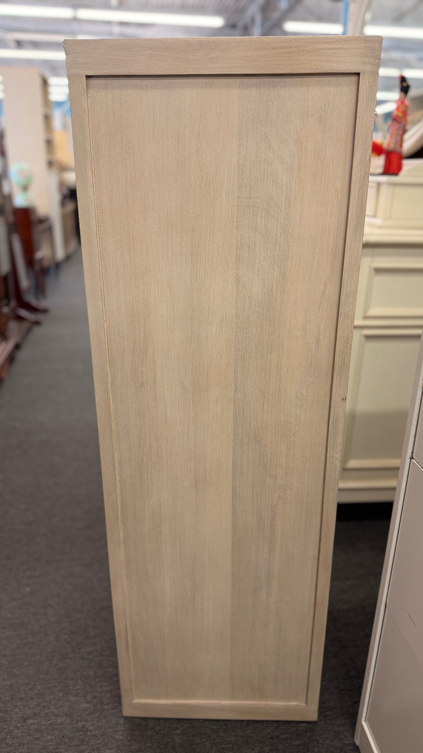 A Pottery Barn light cerused oak 5-drawer lingerie chest featuring handle-less recessed drawer fronts in excellent condition.