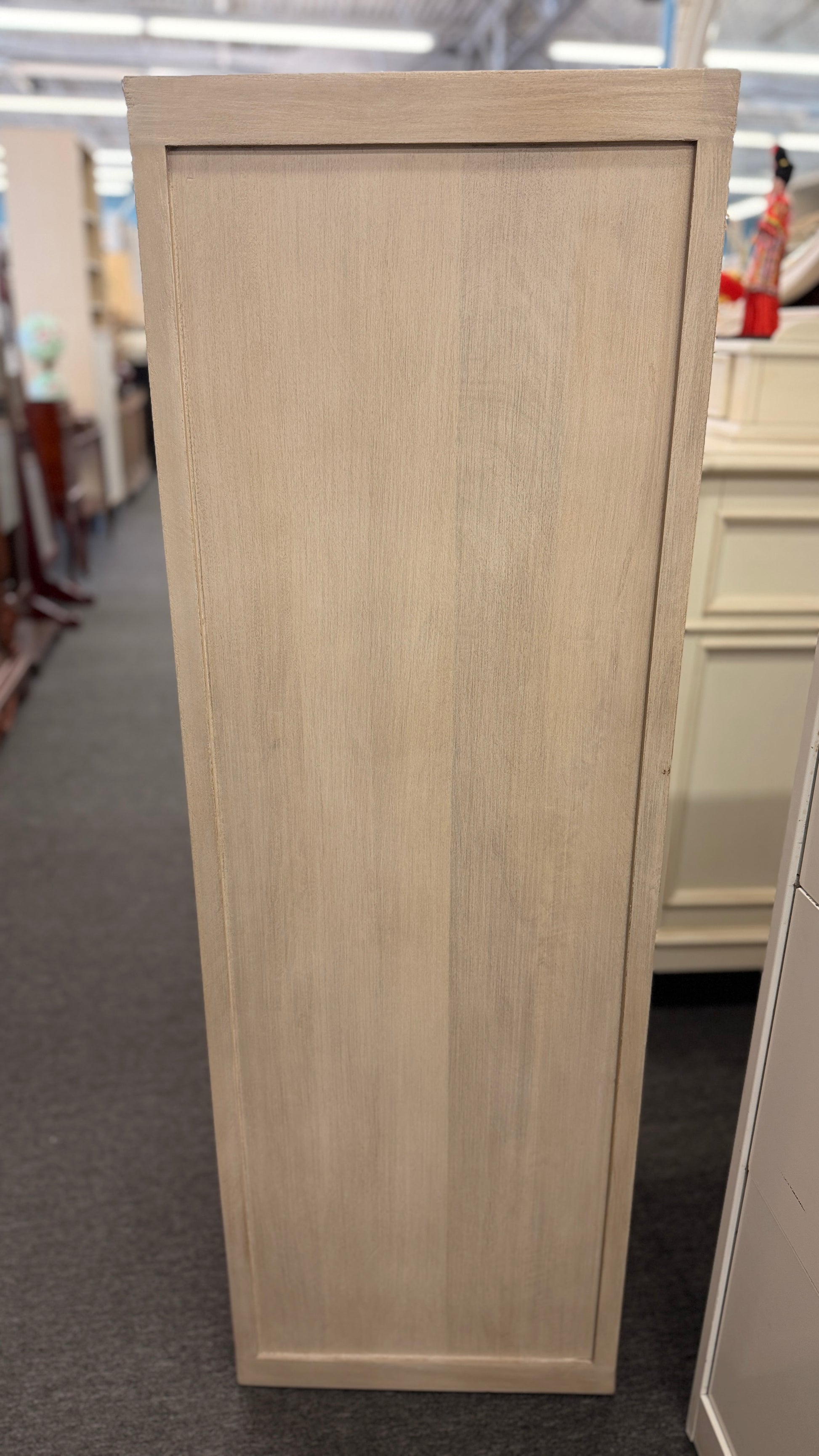 A Pottery Barn light cerused oak 5-drawer lingerie chest featuring handle-less recessed drawer fronts in excellent condition.