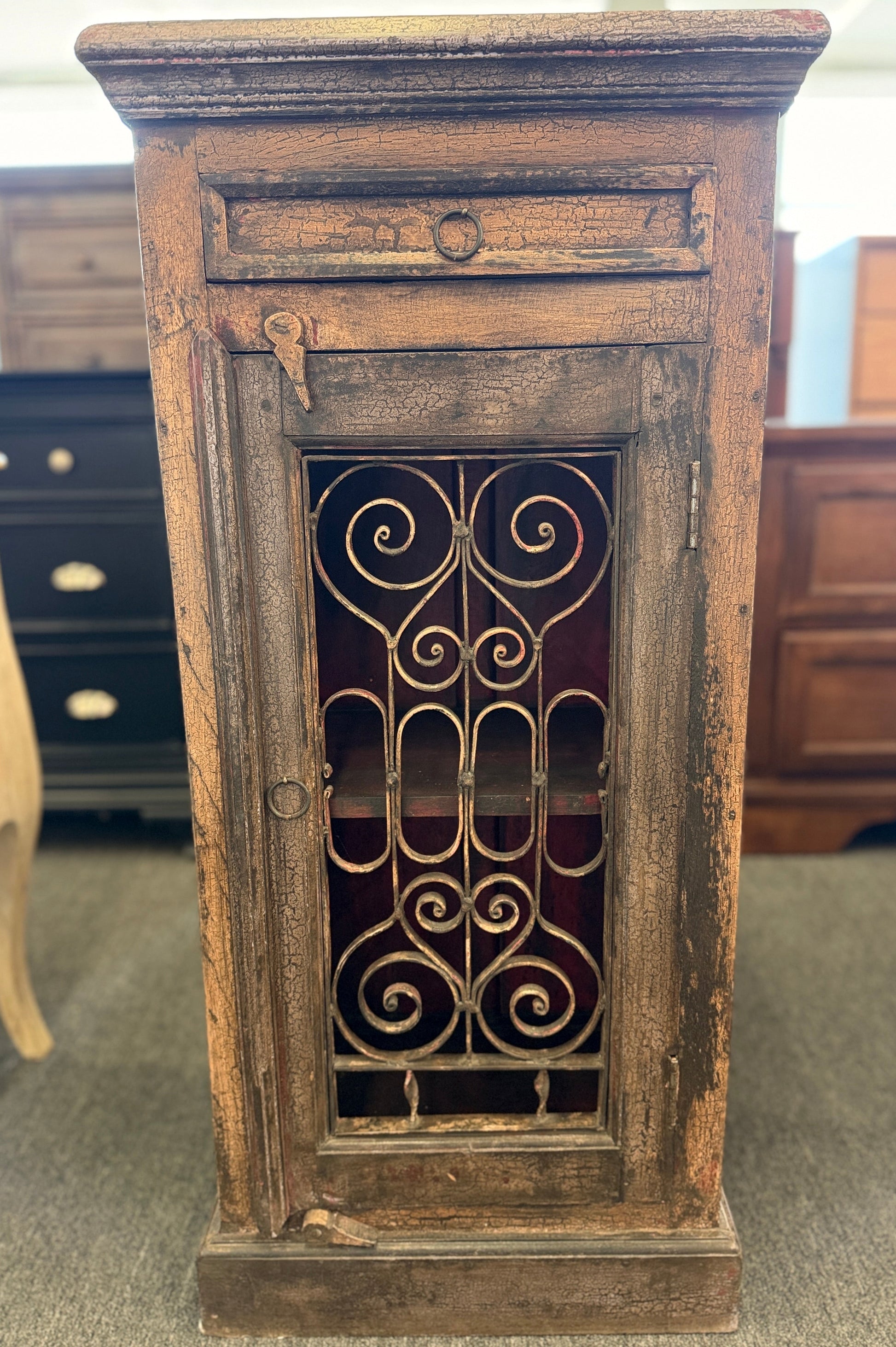 Rustic distressed crackle accent cabinet with wrought iron scrolled grille door at 2nd Debut Houston consignment showroom