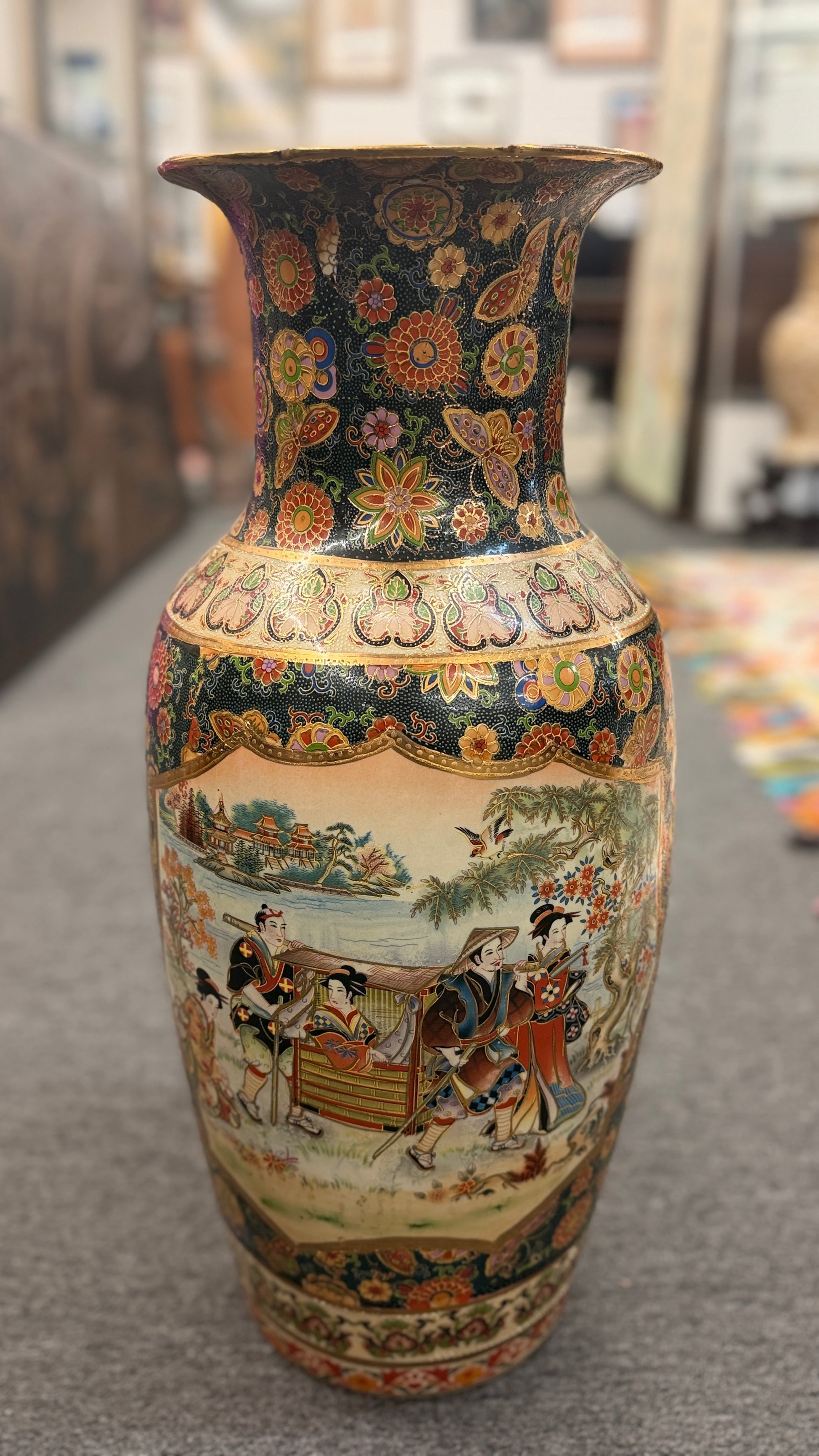 A tall, elegant 24-inch Oriental style ceramic vase featuring a classic tapered silhouette in excellent condition.
