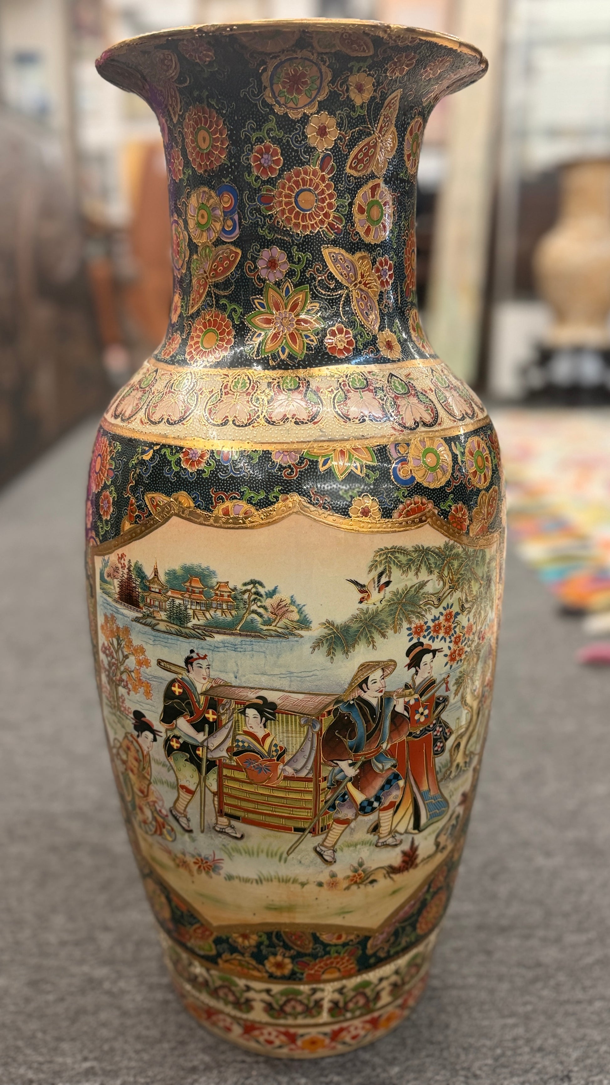 A tall, elegant 24-inch Oriental style ceramic vase featuring a classic tapered silhouette in excellent condition.
