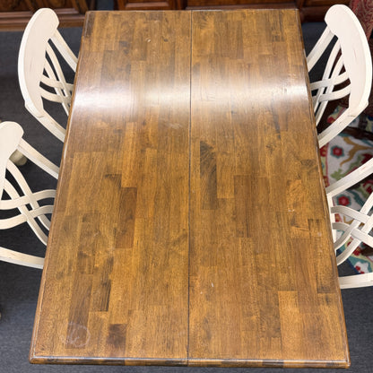 Two-tone counter-height dining set including a rectangular wood-top table with cream-painted turned legs and four matching open-back stools in excellent condition.