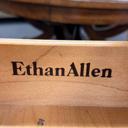 Wooden surface with 'Ethan Allen' engraving