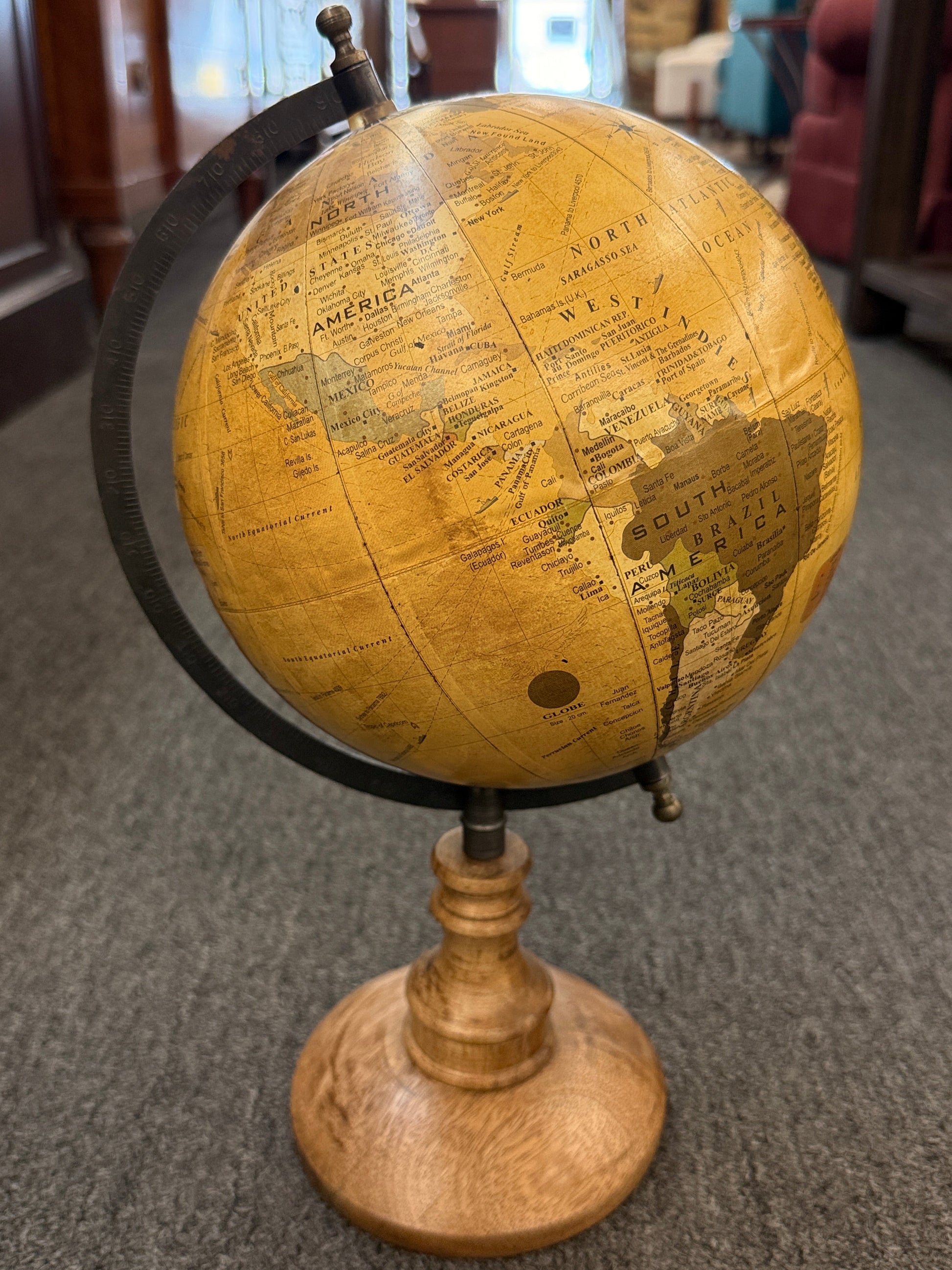 A vintage-inspired 14-inch desktop globe featuring a warm sepia-toned antique map, a dark metal meridian, and a classic turned-wood pedestal base.